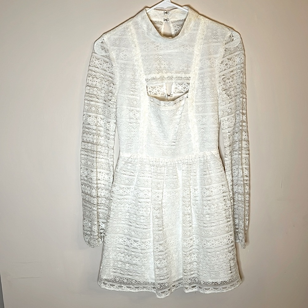 NWOT BCBG Lace Dress With Cutouts.
